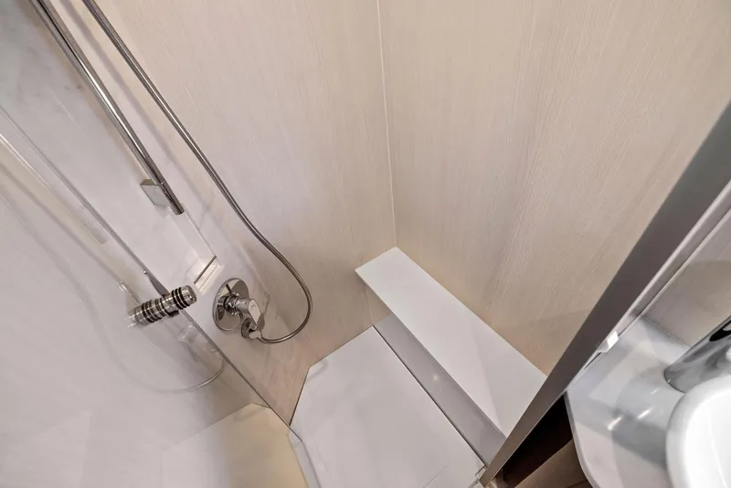 Slide: The Image of Luxurious bathroom in Fairline Phantom 65 yacht, 2024 model. - 40