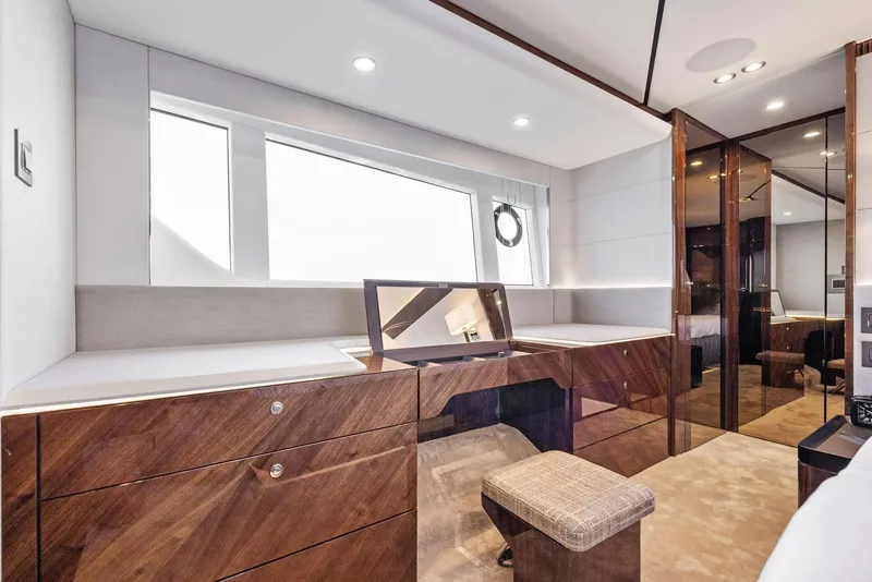 Slide: The Image of Luxurious interior of 2024 Fairline Phantom 65 yacht with elegant seating and ocean view. - 48