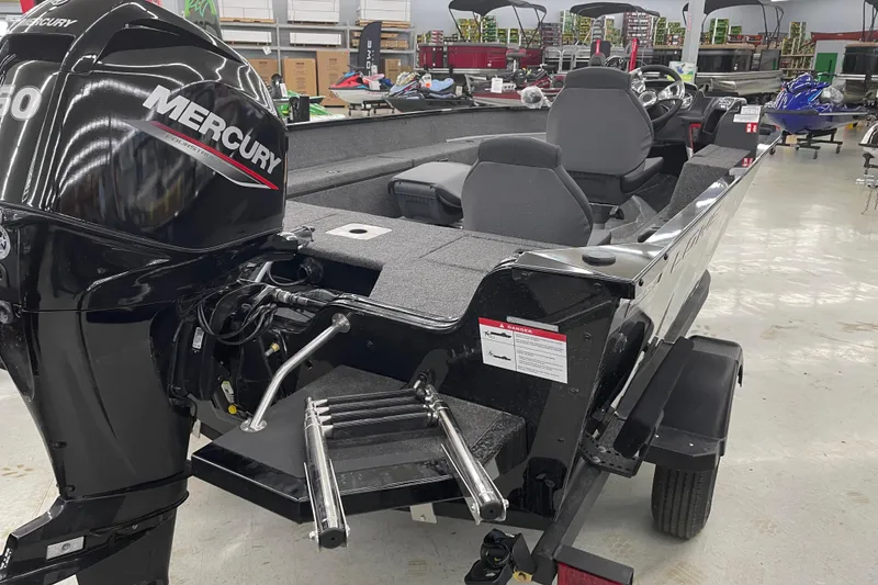 Slide: The Image of 2026 Lowe Fishing Machine 1675SC with Mercury engine in showroom. - 3