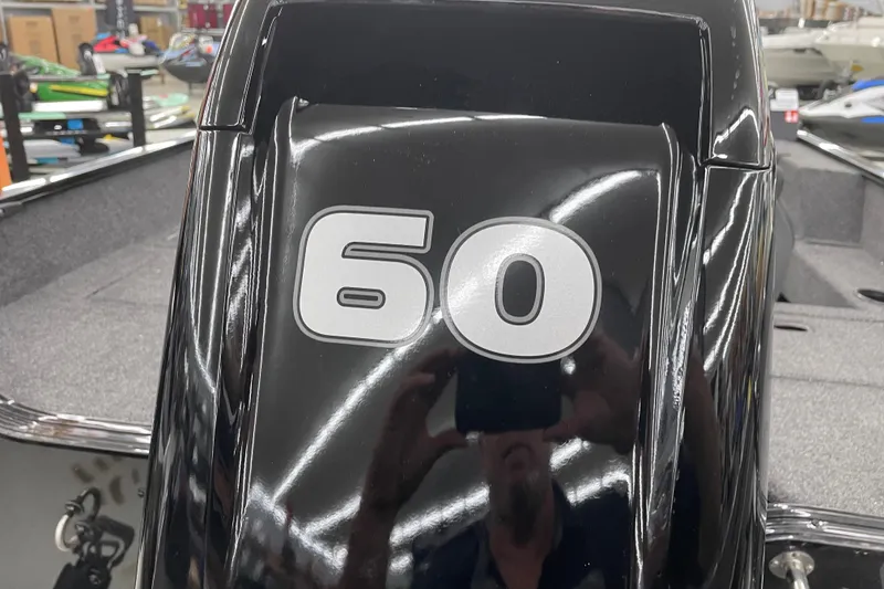 Slide: The Image of 2026 Lowe Fishing Machine 1675SC with 60 HP engine detail. - 7