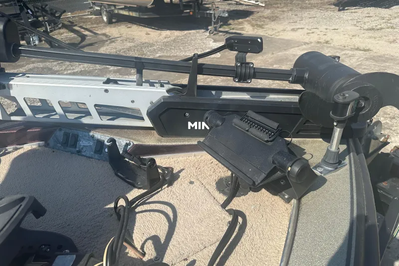 Slide: The Image of 1998 Charger 186 VF boat with mounted trolling motor and control panel. - 6