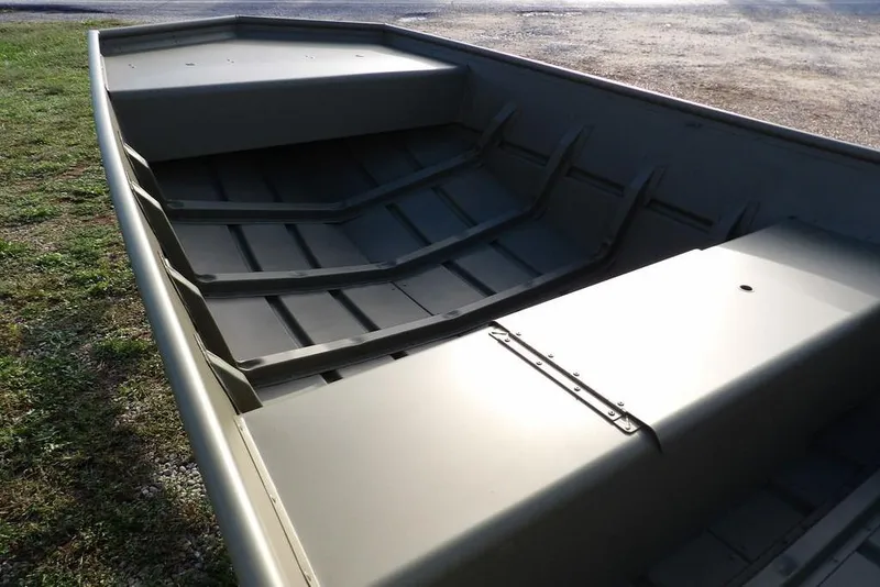 Slide: The Image of 2026 Crestliner 1648M CR Jon boat interior, showcasing durable seating and spacious design. - 15