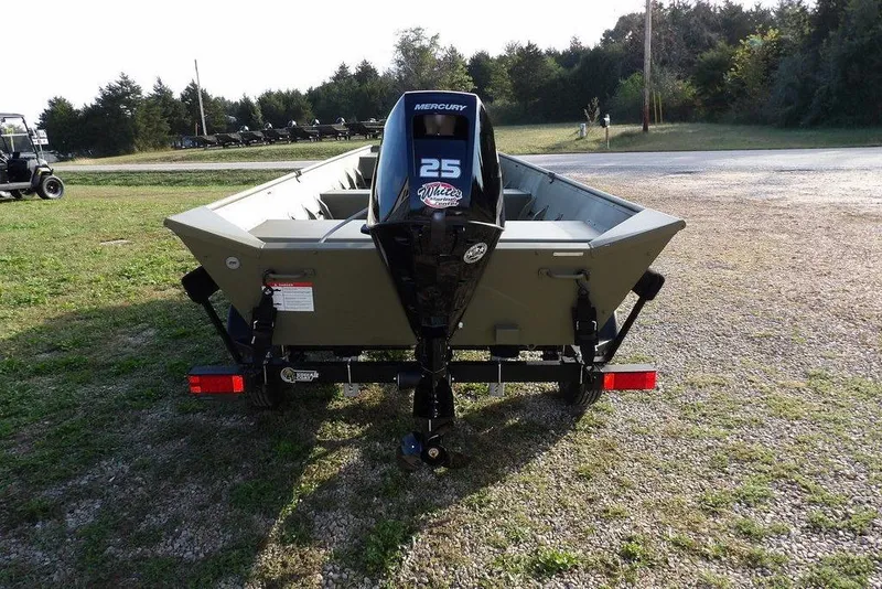 Slide: The Image of 2026 Crestliner 1648M CR Jon boat with Mercury 25 outboard motor on trailer. - 7