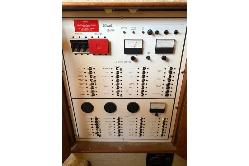 Slide: The Image of Electrical control panel on 1988 Buddy Davis 47 Custom Carolina boat. - 19