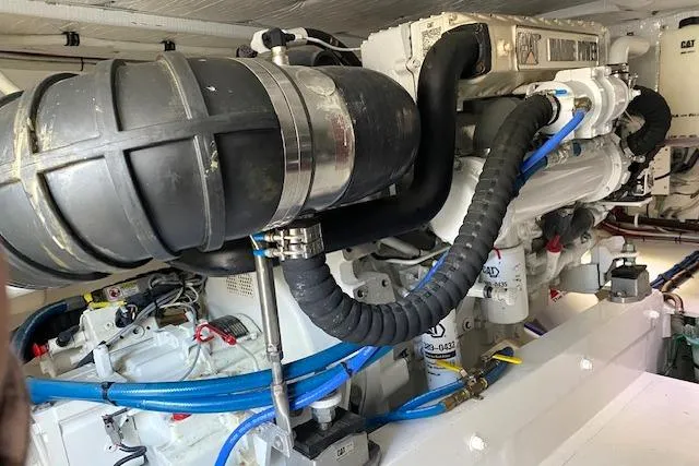 Slide: The Image of Engine room of 1988 Buddy Davis 47 Custom Carolina boat, showcasing mechanical components. - 30