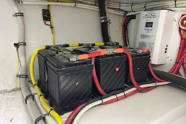 Slide: The Image of Battery setup in a 1988 Buddy Davis 47 Custom Carolina boat. - 36