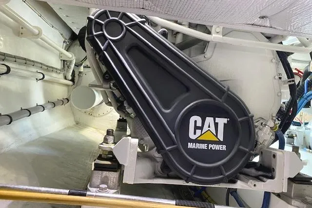 Slide: The Image of Engine room of 1988 Buddy Davis 47 Custom Carolina with CAT Marine Power. - 38