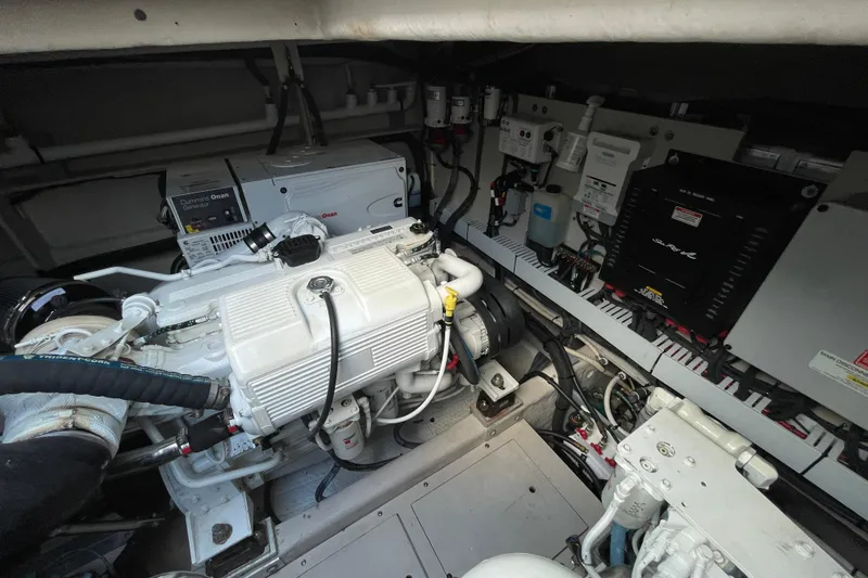 Slide: The Image of Engine room of 2013 Sea Ray 510 Sundancer with Cummins Onan generator and electrical systems. - 15