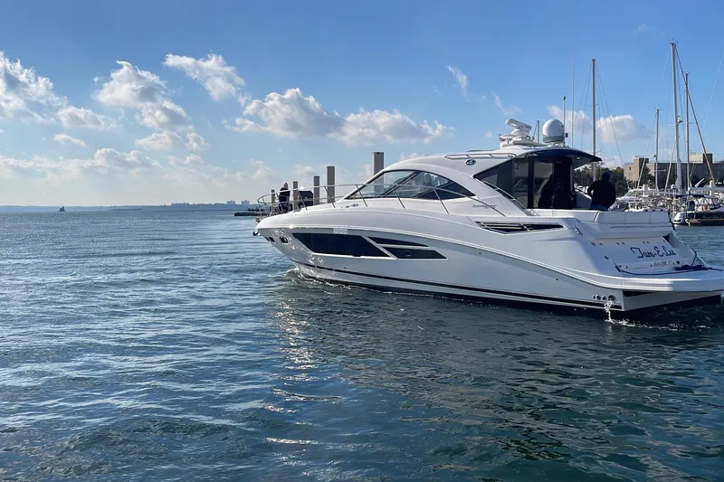 Slide: The Image of 2013 Sea Ray 510 Sundancer yacht cruising on a sunny day. - 2