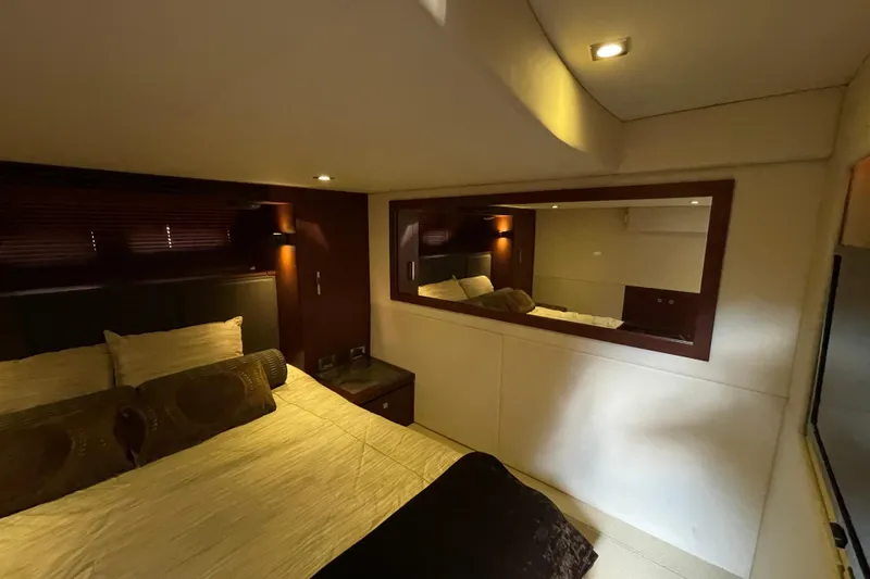 Slide: The Image of Luxurious bedroom interior of 2013 Sea Ray 510 Sundancer yacht with elegant lighting. - 37