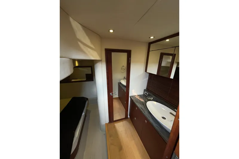 Slide: The Image of Luxurious bathroom interior of 2013 Sea Ray 510 Sundancer yacht with modern fixtures. - 38