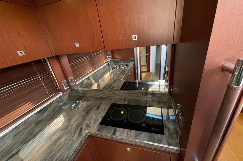 Slide: The Image of Luxurious kitchen interior of 2013 Sea Ray 510 Sundancer yacht with modern appliances. - 44