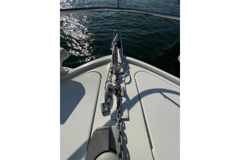 Slide: The Image of Bow of 2013 Sea Ray 510 Sundancer yacht with anchor chain, on water. - 5