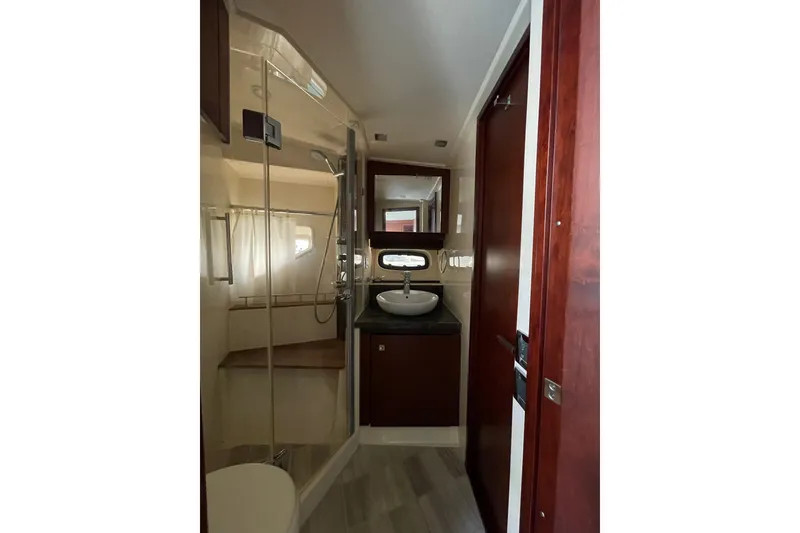 Slide: The Image of Luxurious bathroom interior of 2013 Sea Ray 510 Sundancer yacht with modern fixtures. - 52