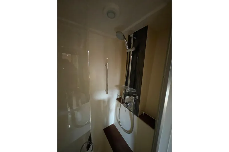 Slide: The Image of Shower area in 2013 Sea Ray 510 Sundancer yacht, featuring modern fixtures. - 54