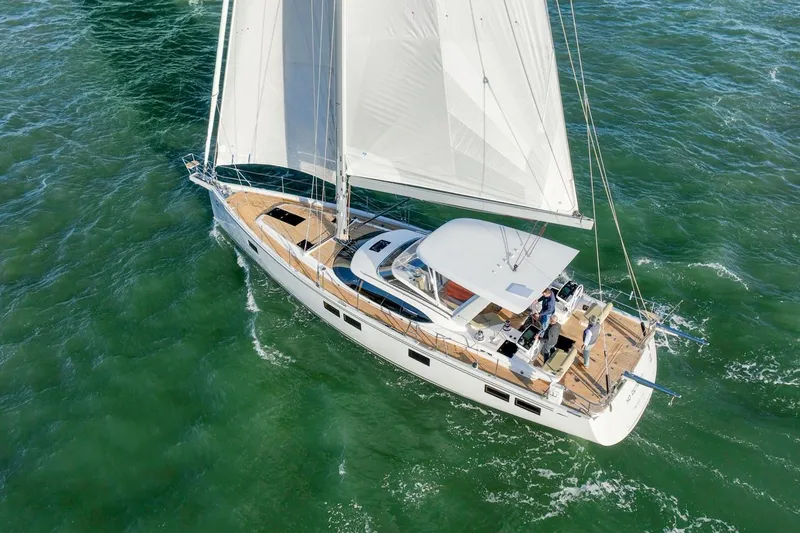 Slide: The Image of Sailing yacht Hylas H57 2020 gliding on open sea with full sails. - 10