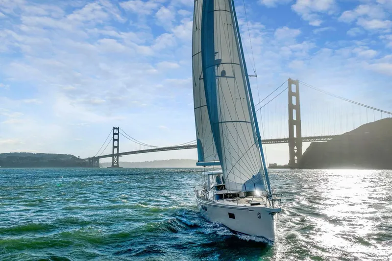 Slide: The Image of Sailing yacht Hylas H57, 2020 model, near iconic bridge on a sunny day. - 14