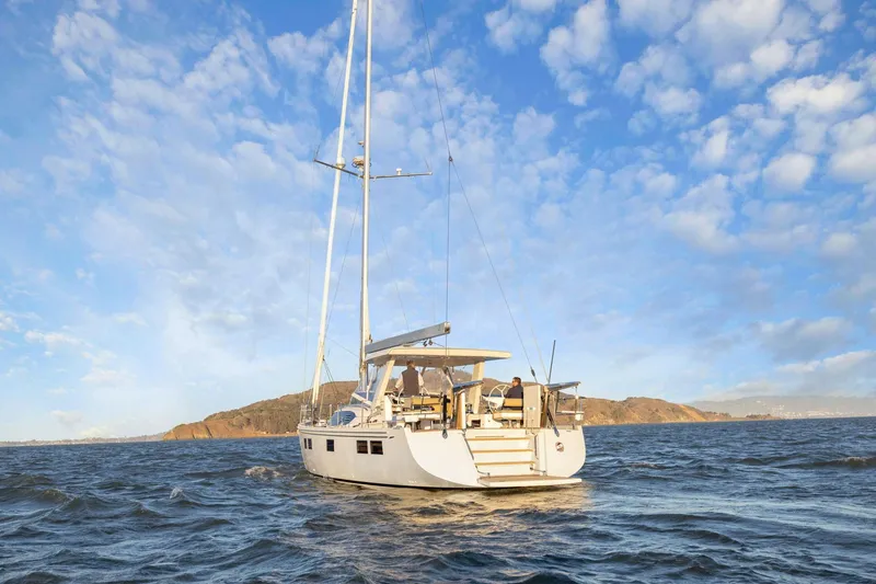 Slide: The Image of Sailing yacht Hylas H57 (2020) on open water under a blue sky. - 16
