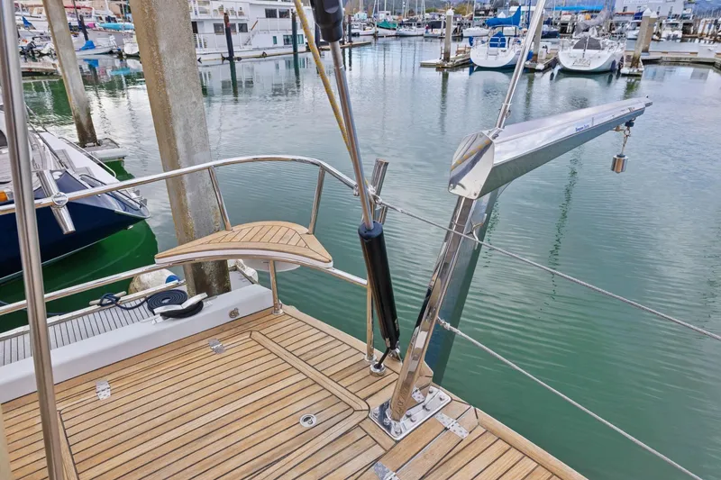 Slide: The Image of Deck of 2020 Hylas H57 yacht with marina view and wooden finish. - 22