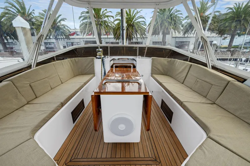 Slide: The Image of Luxurious 2020 Hylas H57 yacht interior with elegant seating and wooden accents. - 34