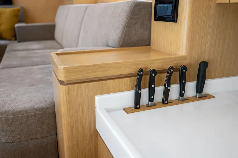 Slide: The Image of Modern Hylas H57 yacht interior with knife set and comfortable seating, 2020 model. - 72