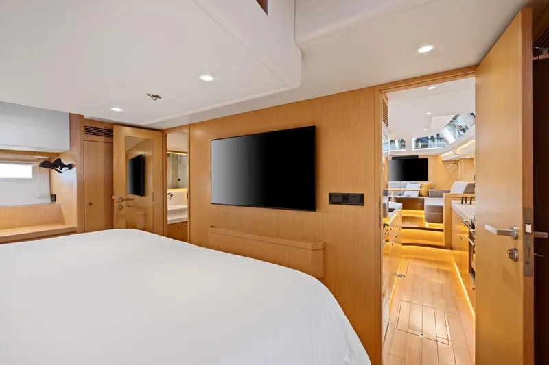 Slide: The Image of Luxurious interior of 2020 Hylas H57 yacht featuring modern bedroom and living area. - 80