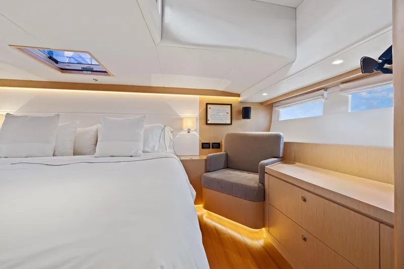 Slide: The Image of Luxurious interior of 2020 Hylas H57 yacht with cozy bed and seating area. - 82