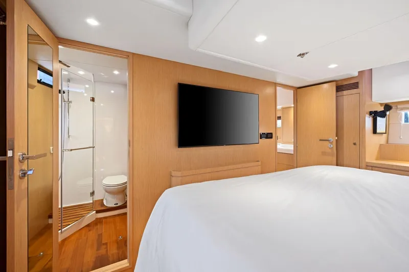 Slide: The Image of Luxurious interior of 2020 Hylas H57 yacht featuring bedroom and ensuite bathroom. - 83