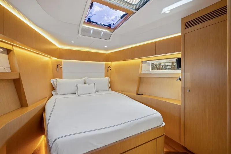 Slide: The Image of Luxurious cabin interior of 2020 Hylas H57 yacht with modern wood finish. - 86