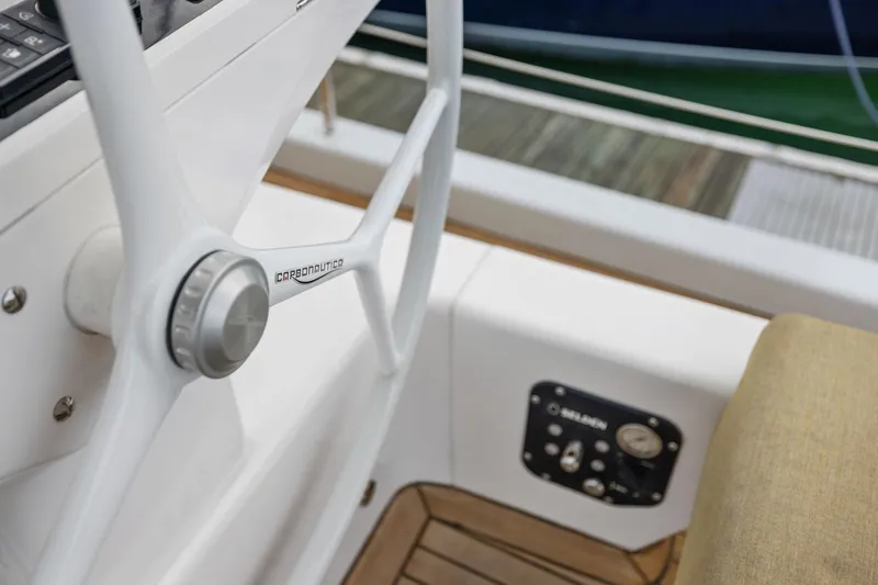 Slide: The Image of Steering wheel of 2020 Hylas H57 yacht with Carbonautica branding. - 28