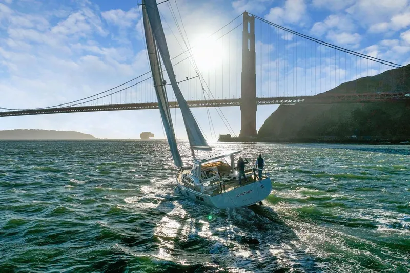 Slide: The Image of Sailboat Hylas H57 (2020) cruising under Golden Gate Bridge in sunny weather. - 3