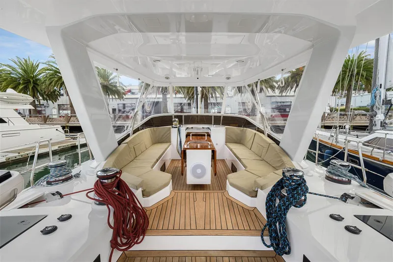 Slide: The Image of Luxurious 2020 Hylas H57 yacht cockpit with cushioned seating and teak flooring. - 33
