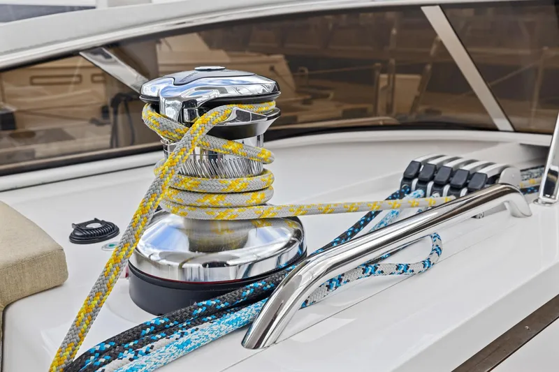 Slide: The Image of Close-up of winch and ropes on 2020 Hylas H57 yacht deck. - 36