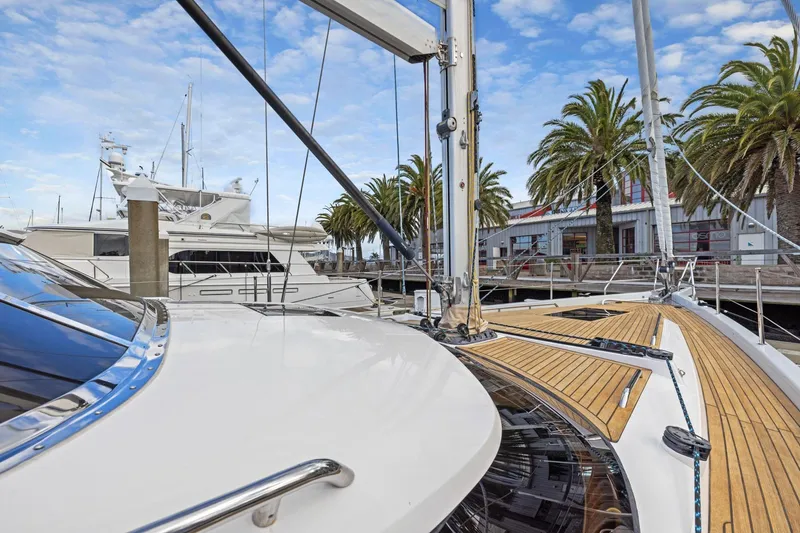 Slide: The Image of Luxury Hylas H57 yacht docked at marina with palm trees, 2020 model. - 43
