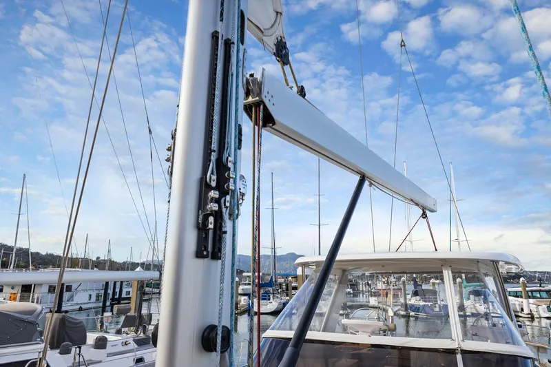 Slide: The Image of Sailboat mast and rigging on a 2020 Hylas H57 at a marina. - 52