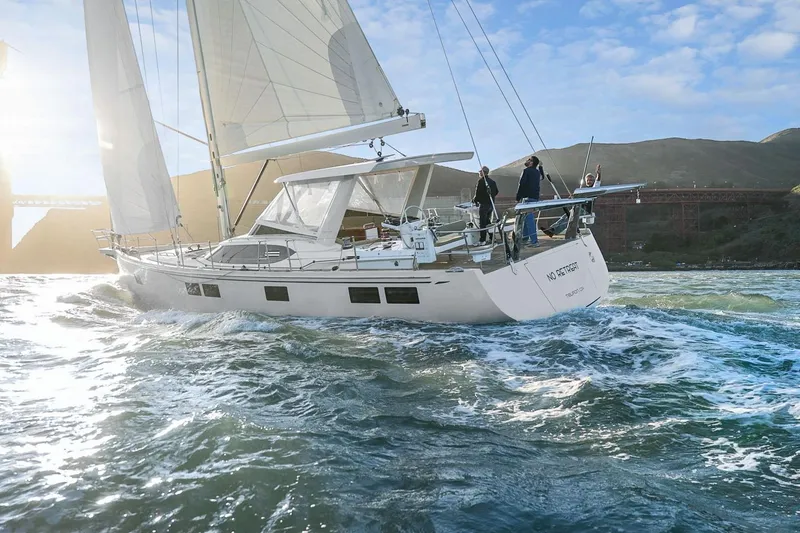 Slide: The Image of Sailing yacht Hylas H57, 2020 model, cruising in sunny waters with crew onboard. - 6