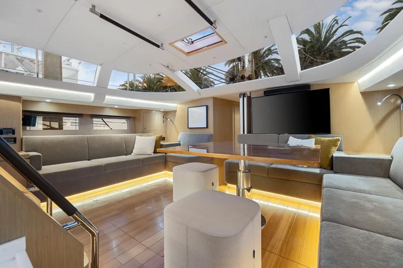 Slide: The Image of Luxurious interior of 2020 Hylas H57 yacht with modern seating and large windows. - 66