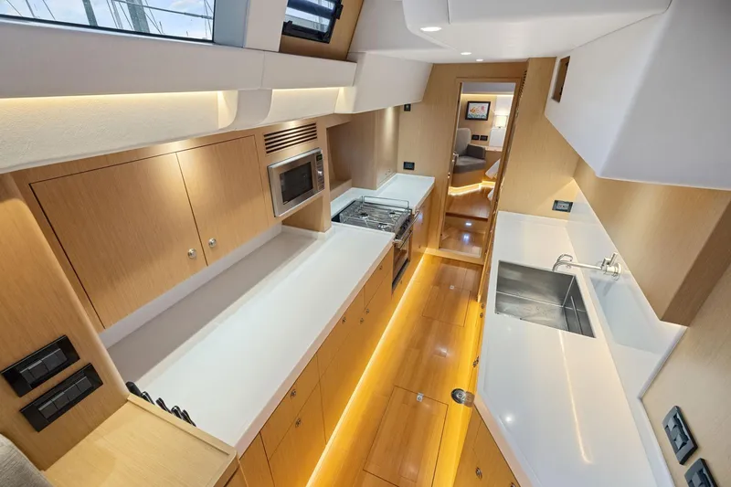 Slide: The Image of Luxurious interior of 2020 Hylas H57 yacht featuring modern kitchen design. - 69