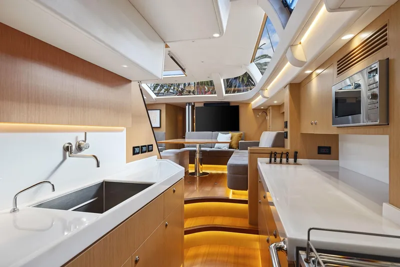 Slide: The Image of Luxurious interior of 2020 Hylas H57 yacht with modern kitchen and seating area. - 71