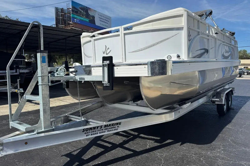 Slide: The Image of 2026 JC Spirit 222 TT Sport pontoon boat on trailer at Sonny's Marine. - 3