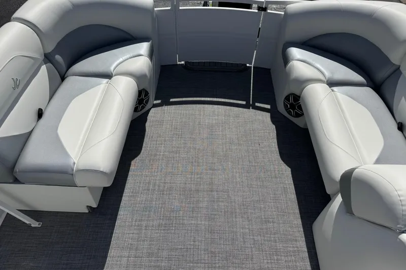 Slide: The Image of Luxurious seating on 2026 JC Spirit 222 TT Sport pontoon boat, featuring sleek gray upholstery. - 7