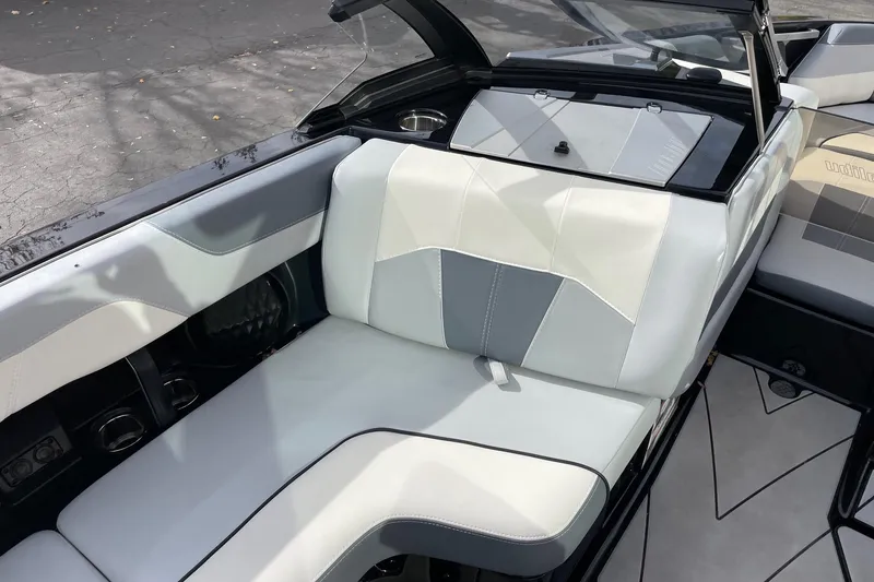 Slide: The Image of 2023 Malibu Wakesetter 20 VTX interior with sleek, modern seating design. - 10