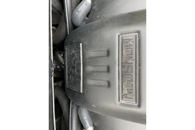 Slide: The Image of 2023 Malibu Wakesetter 20 VTX engine with Monsoon branding. - 14