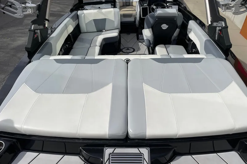 Slide: The Image of 2023 Malibu Wakesetter 20 VTX interior with sleek, modern seating and stylish design. - 4