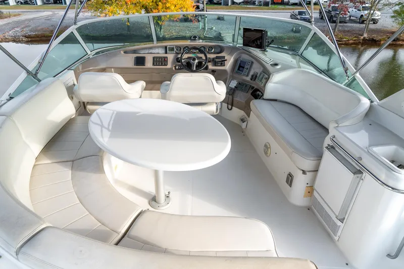 Slide: The Image of Luxurious 2000 Carver 450 Voyager Pilothouse yacht interior with seating and helm. - 17