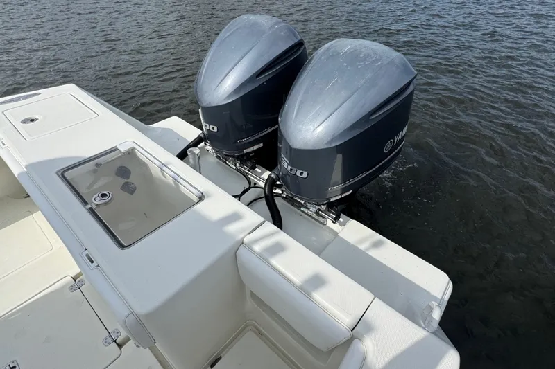Slide: The Image of 2013 SeaVee 320B boat with dual Yamaha outboard engines on the water. - 30