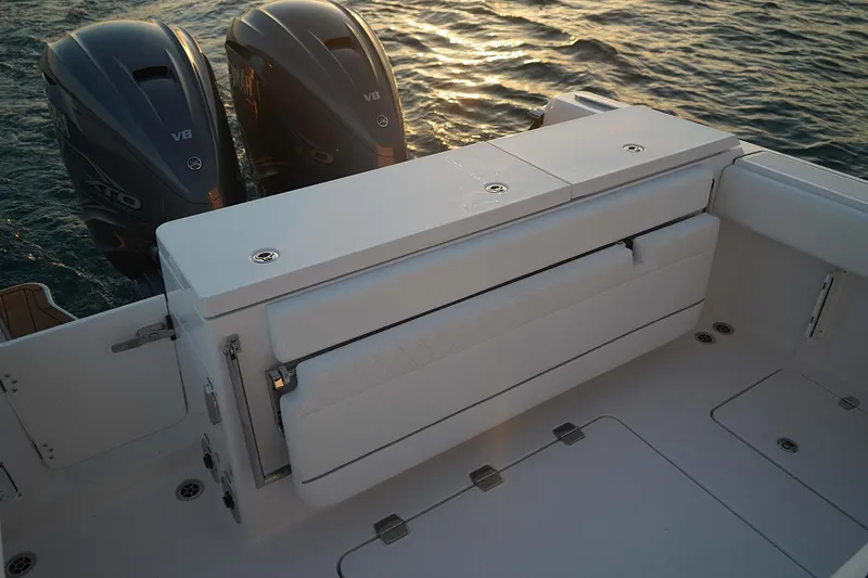 Slide: The Image of Manufacturer Provided Image: 2025 Southport 33 FE boat with dual V8 engines at sunset. - 11