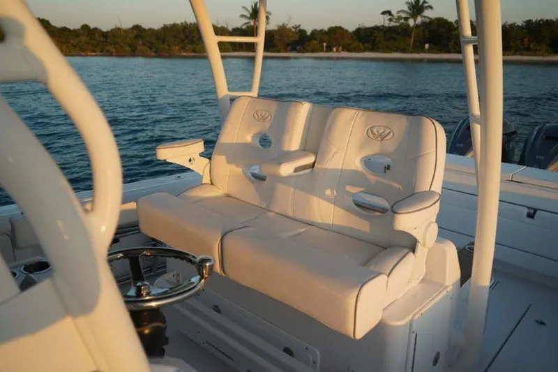 Slide: The Image of Manufacturer Provided Image: Luxurious seating on 2025 Southport 33 FE boat, with ocean view in the background. - 5