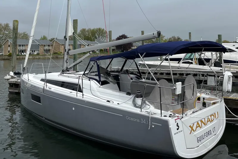 The Image of 2024 Beneteau Oceanis 34.1 sailboat docked, featuring sleek design and modern amenities. - 0