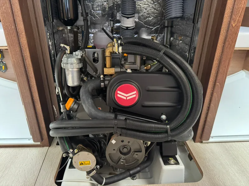 Slide: The Image of 2024 Beneteau Oceanis 34.1 engine compartment, showcasing modern marine engineering. - 21